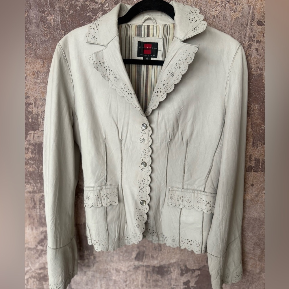 Leather laser cut detail bone color jacket snap closure with pockets